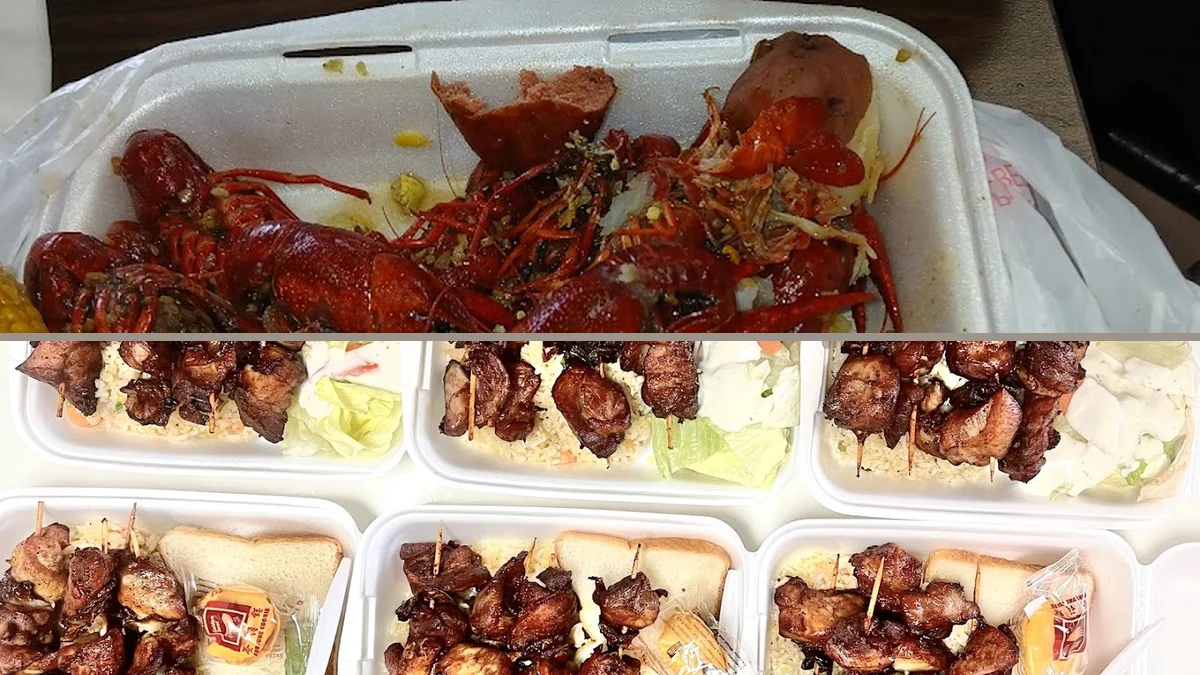 Fried shrimp and oysters on paper-lined trays.